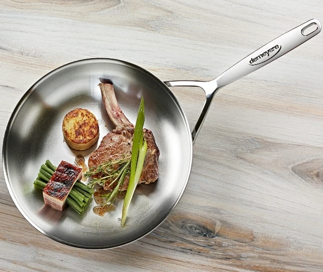Image of food sitting in a Demeyere 5-Plus Teflon alternative skillet