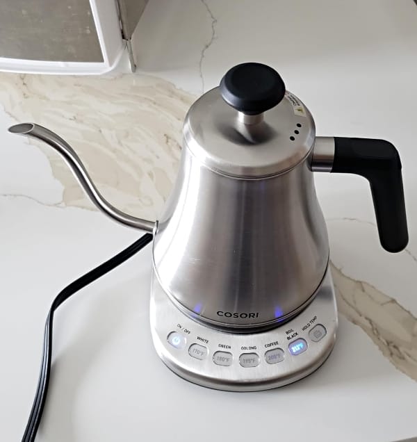 Cosori-gooseneck-stainless-steel-electric-water-kettle on white marble countertop