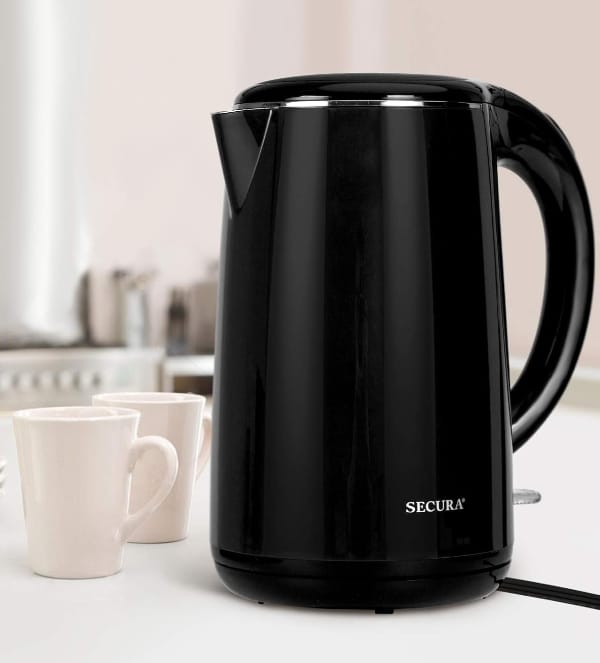 Secura Non-Toxic Electric Water Kettle On Countertop next to two white mugs